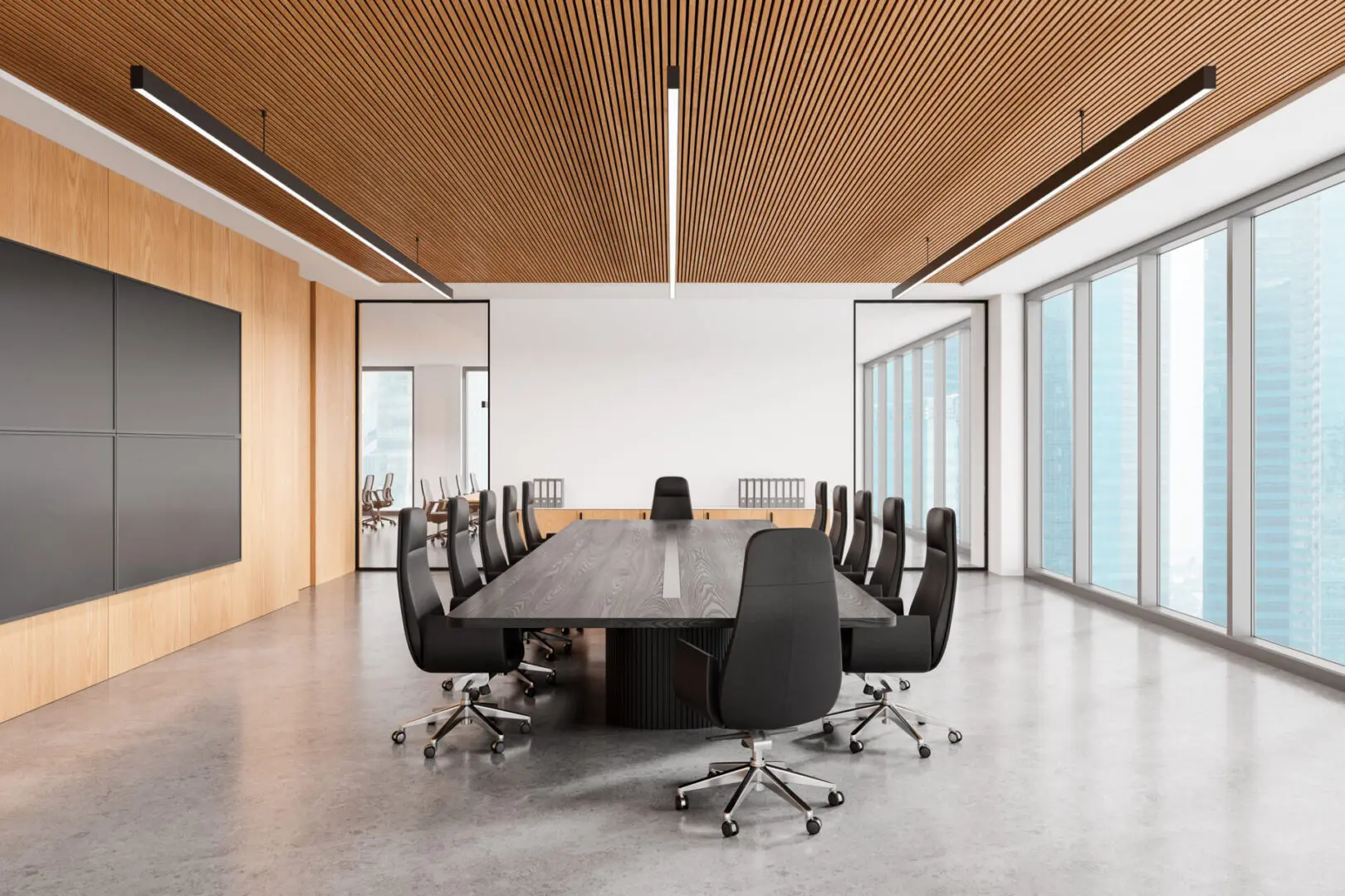 Modern conference room with large table.